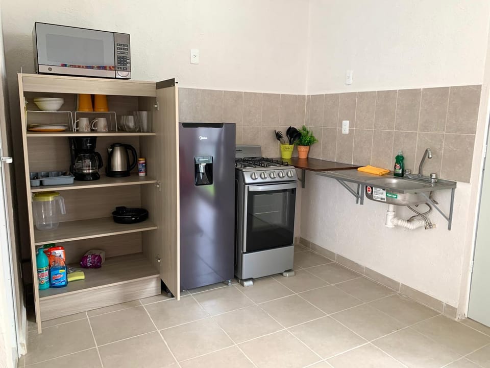 Kitchen or kitchenette, minibar, toaster
