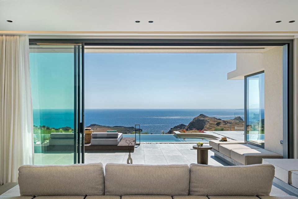 Natural landscape, View (from property/room), Living room, Seating area, Sea view