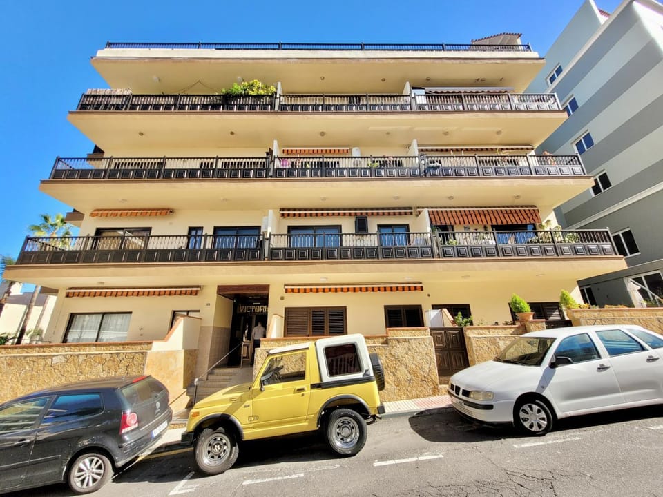 Property building, Facade/entrance, Day, Parking