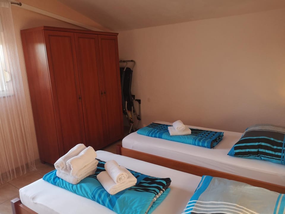 Bed, Photo of the whole room, Bedroom, towels, wardrobe