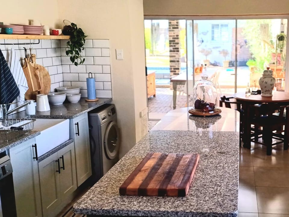 Kitchen or kitchenette, dishwasher, stove, washing machine