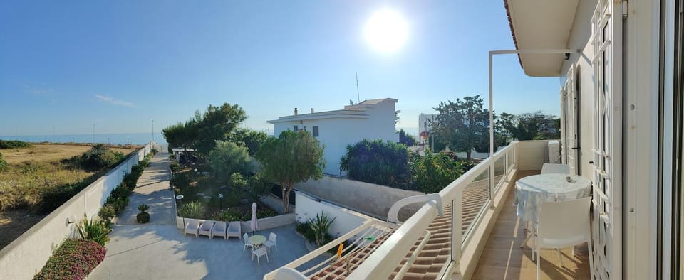 Property building, Day, Natural landscape, View (from property/room), Balcony/Terrace, Sea view