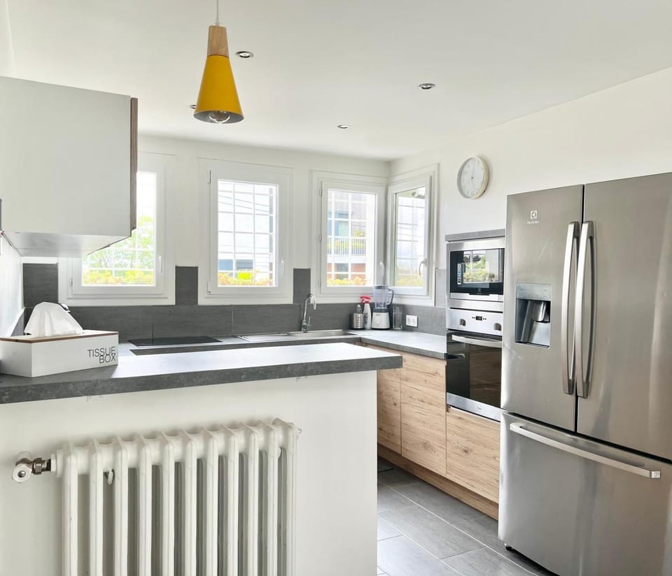 Villa climatisée 10 minutes Paris familles et groupes House in Île-de-France