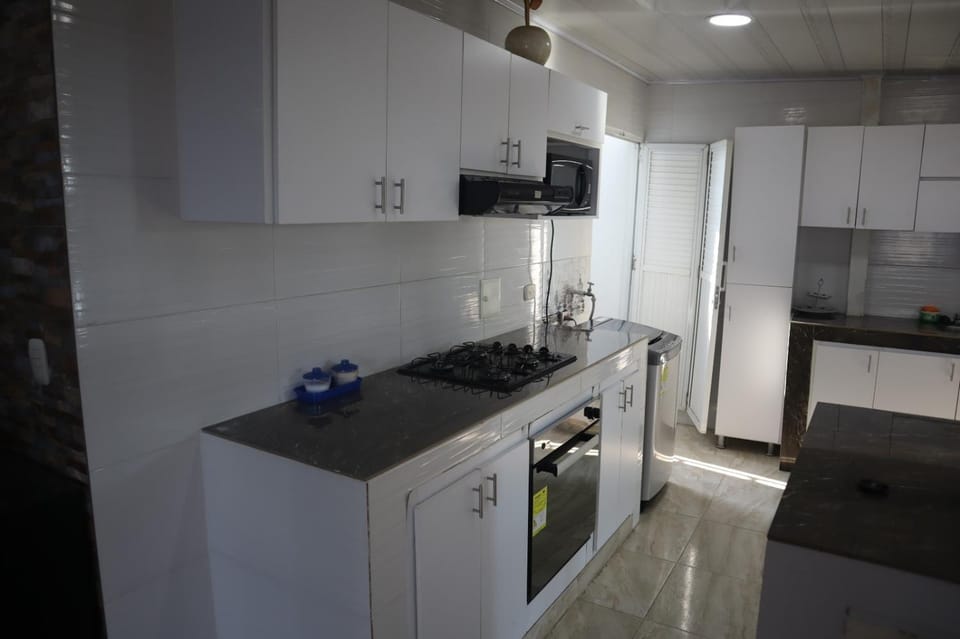 Kitchen or kitchenette, oven