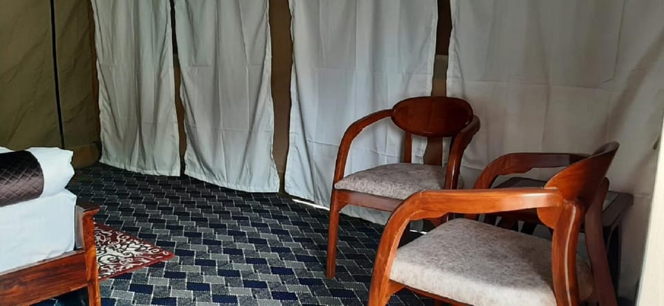 Bed, Living room, Seating area, Bedroom