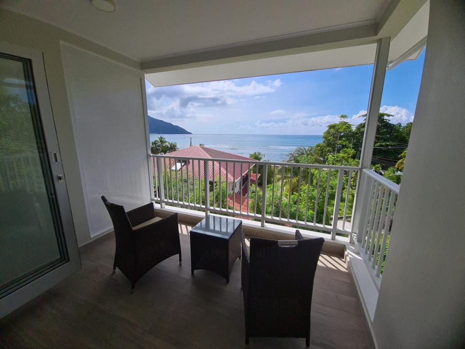 Patio, Day, Natural landscape, View (from property/room), Balcony/Terrace, Living room, Seating area, Dining area, Mountain view, Sea view, Sunset