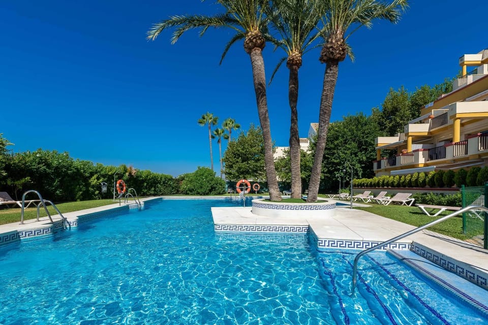 Property building, Living room, Swimming pool