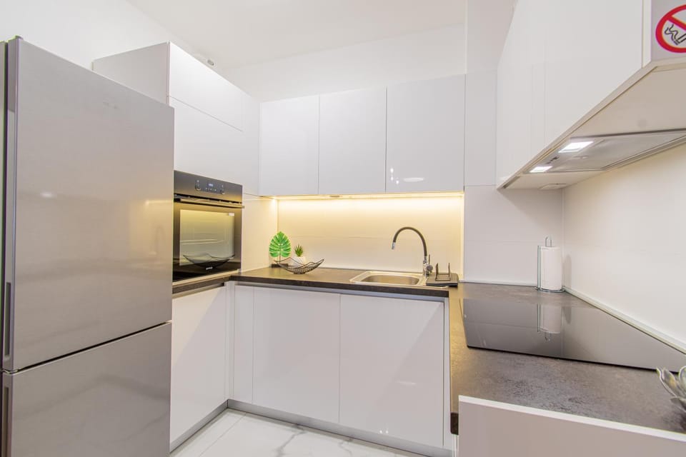 Kitchen or kitchenette, oven, stove