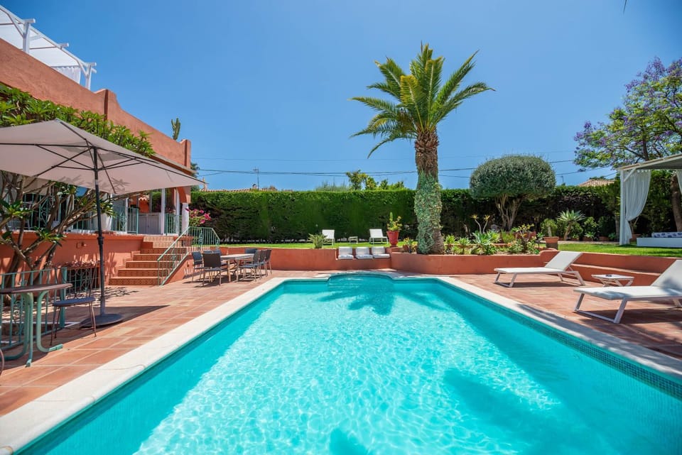 Property building, Living room, Swimming pool