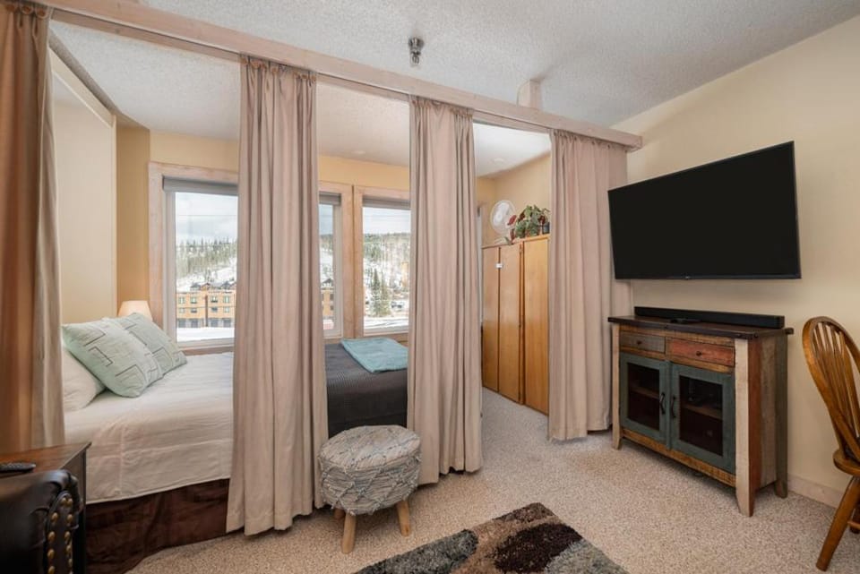 Bed, TV and multimedia, Bedroom, Mountain view, furniture, wardrobe