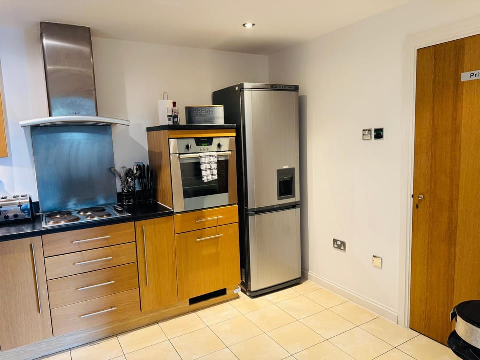 Kitchen or kitchenette, stove, toaster