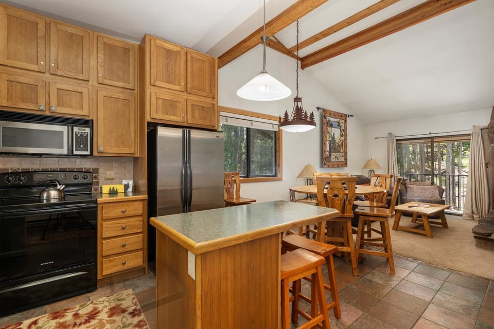 Kitchen or kitchenette, Dining area, furniture, microwave, oven