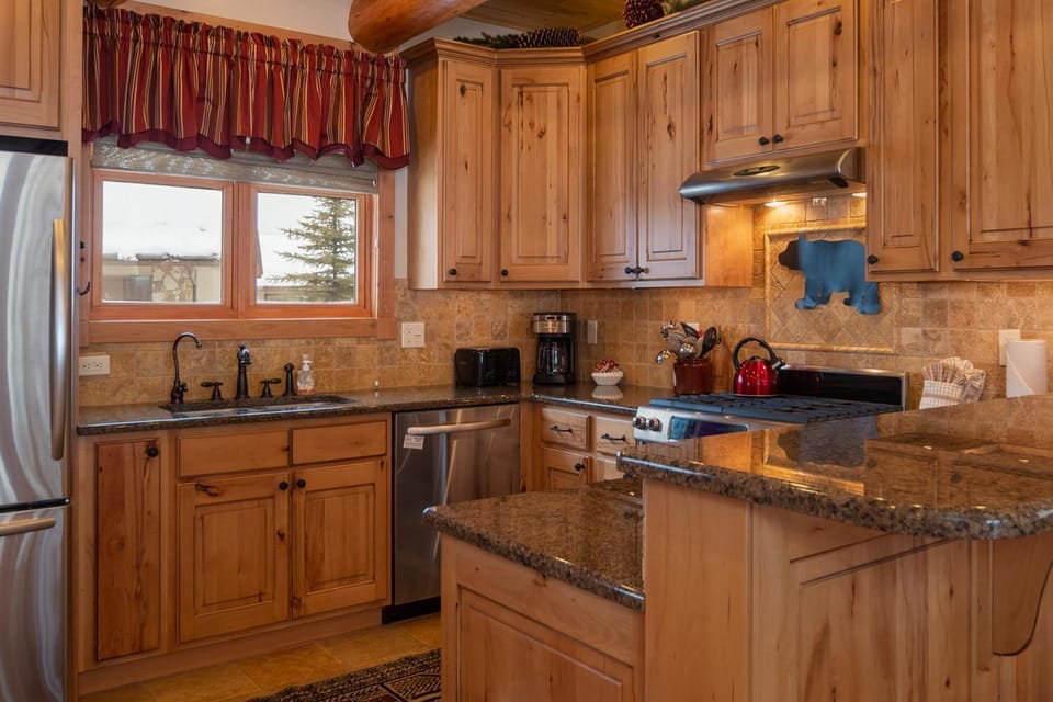 Kitchen or kitchenette, dishwasher, microwave, oven, stove, toaster, kitchen