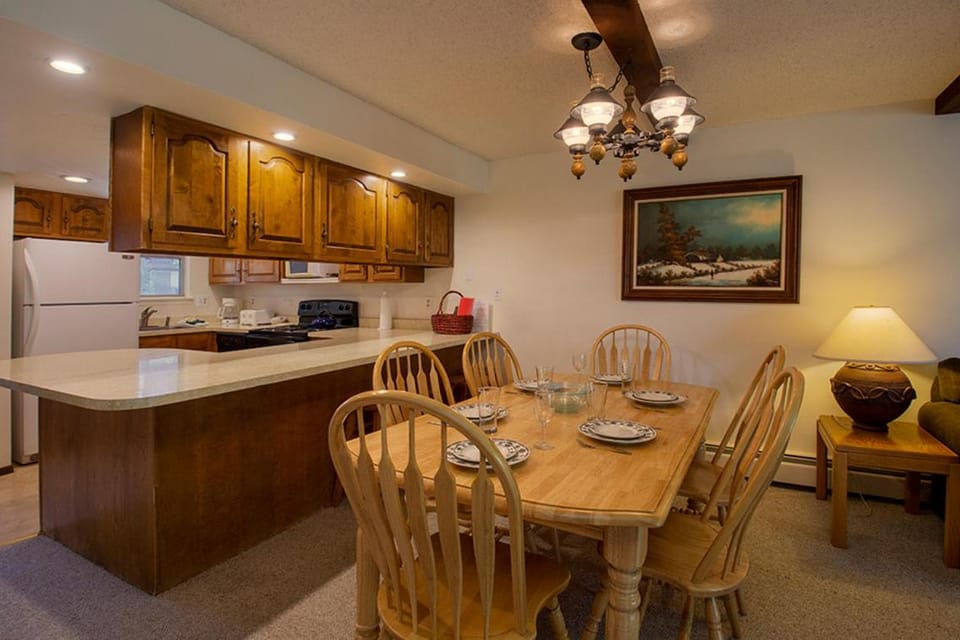 Kitchen or kitchenette, Dining area, furniture, microwave, oven, kitchen