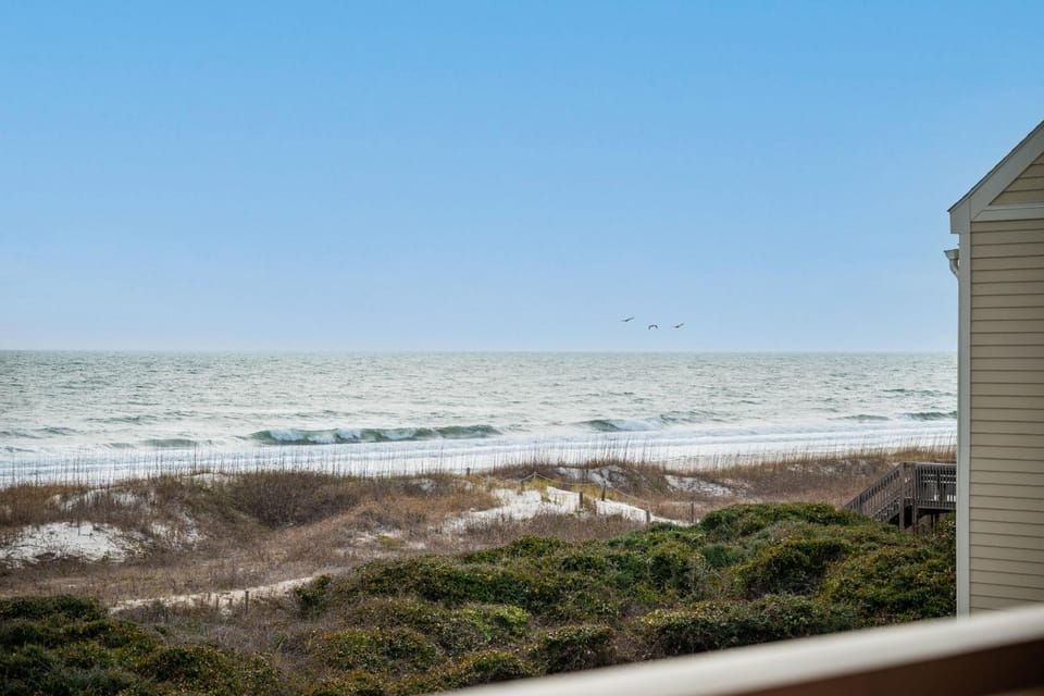 Seven Dozen by Oak Island Accommodations Apartment in Caswell Beach