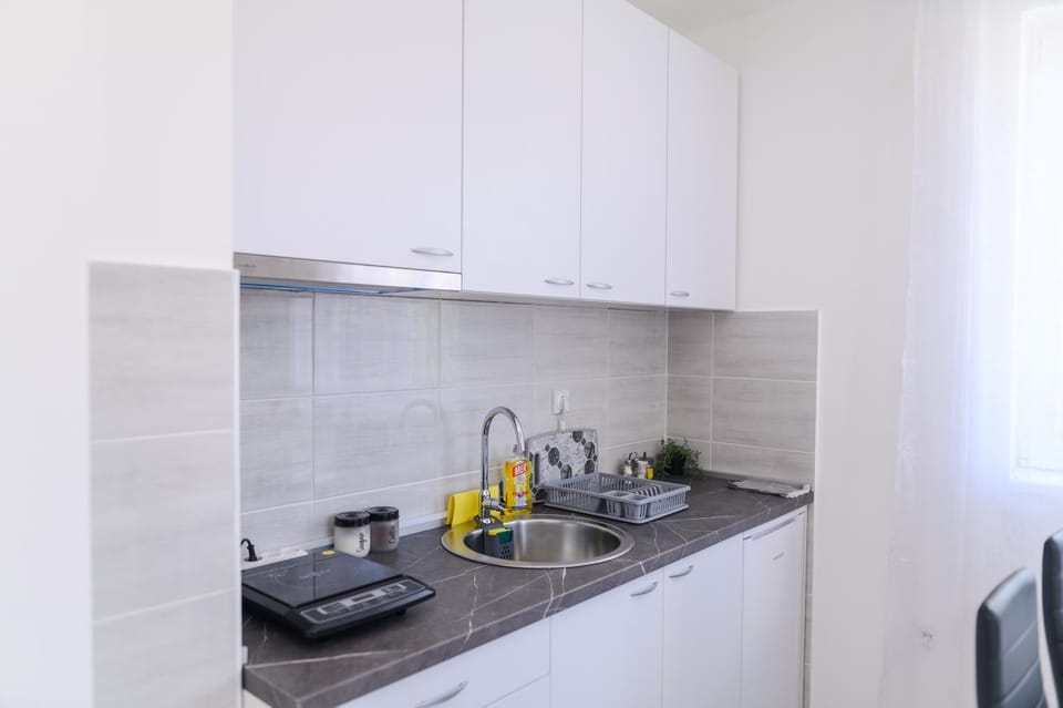 Kitchen or kitchenette, stove