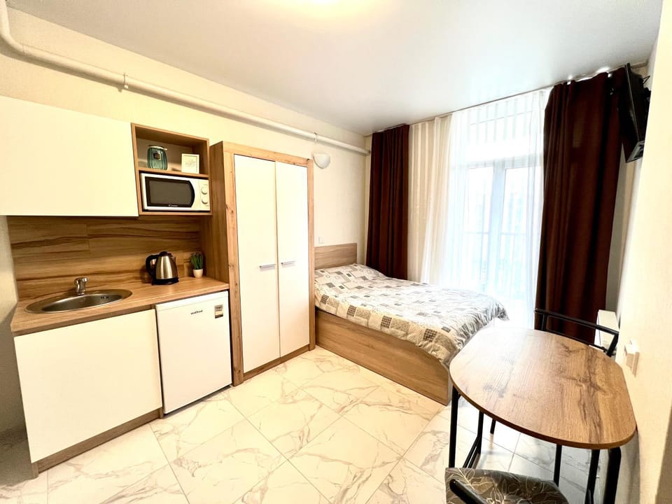 Bed, Coffee/tea facilities, Kitchen or kitchenette, Photo of the whole room, Bedroom, minibar