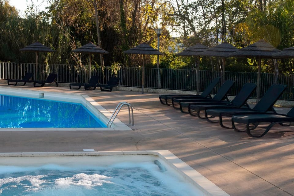 Property building, Living room, Swimming pool