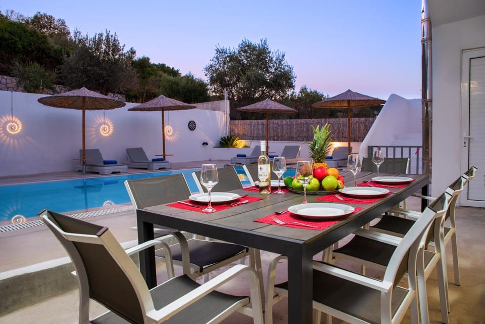 Patio, Seating area, Dining area, Pool view, Swimming pool