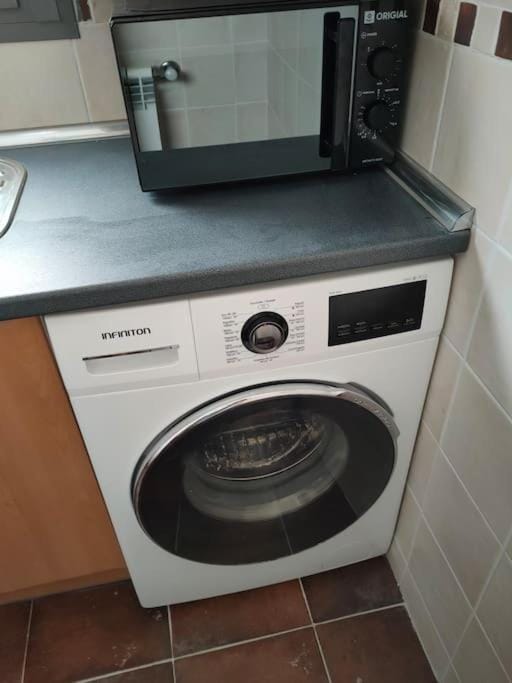 Kitchen or kitchenette, minibar, washing machine
