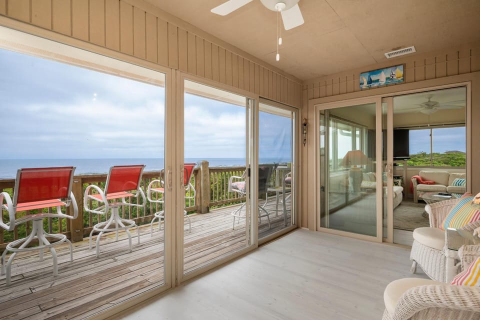 A Searious Sunset View by Oak Island Accommodations Apartment in Caswell Beach