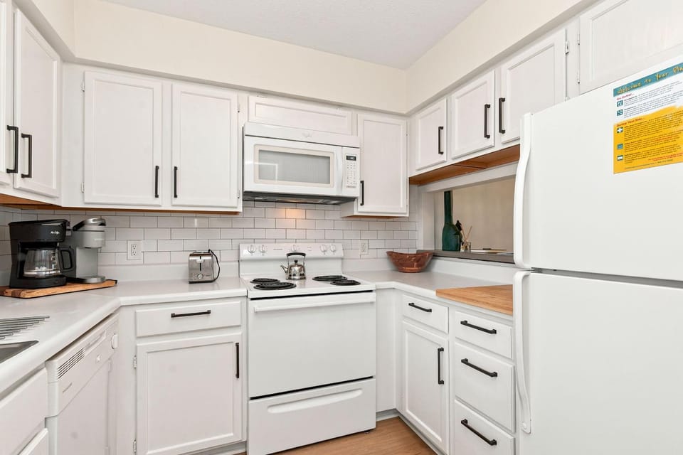 Resting Beach Face by Oak Island Accommodations Apartment in Caswell Beach
