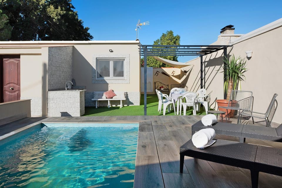 Property building, Living room, Swimming pool