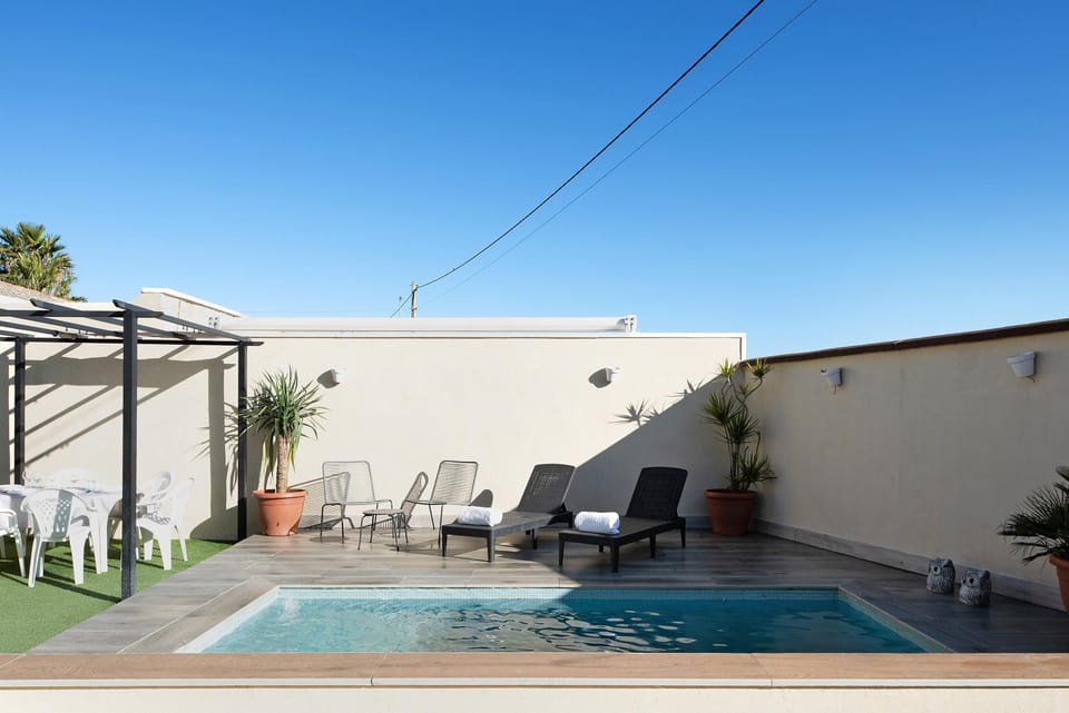 Property building, Living room, Swimming pool
