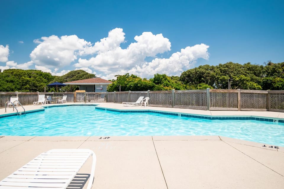 Beach Getaway Among The Oaks by Oak Island Accommodations Apartment in Caswell Beach