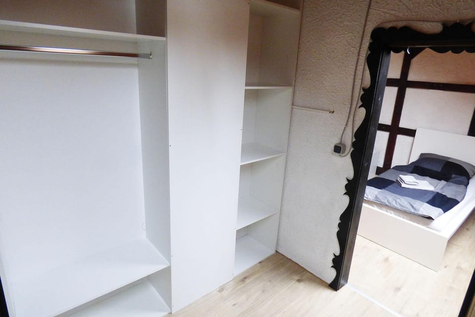 Bed, wardrobe