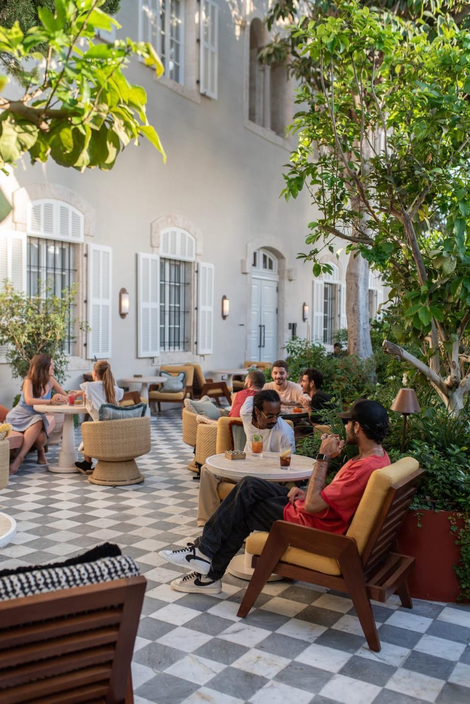 Patio, People, Garden, Seating area, Garden view, group of guests