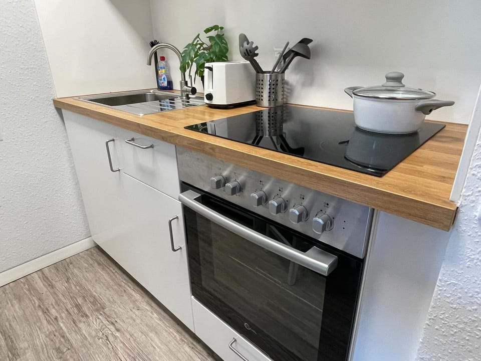 Kitchen or kitchenette, oven, stove, stove, toaster, kitchen