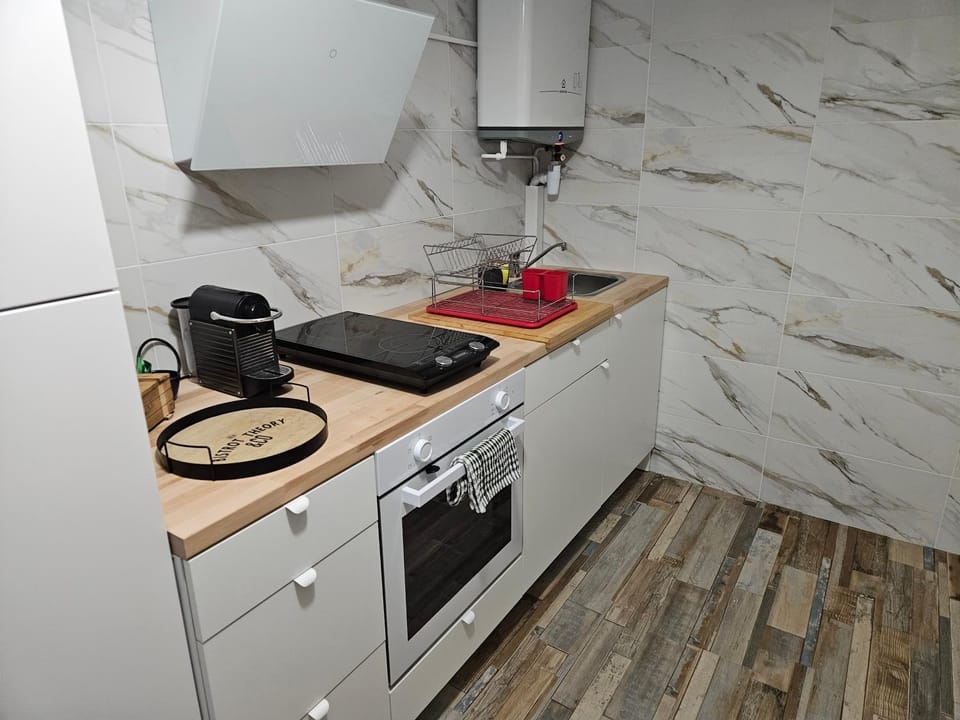 Kitchen or kitchenette, stove