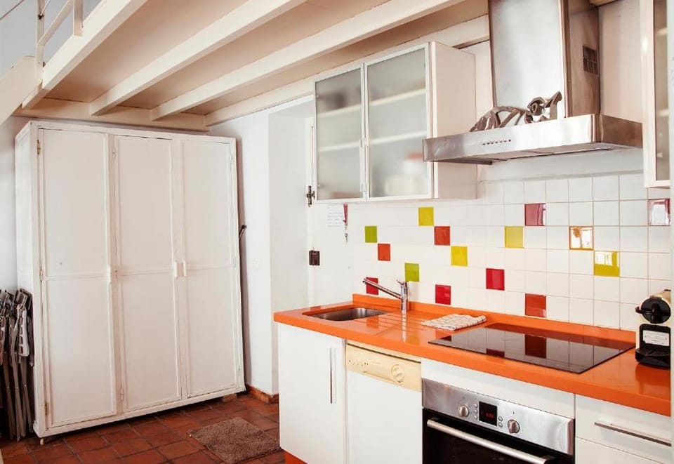 Kitchen or kitchenette, oven, stove, wardrobe