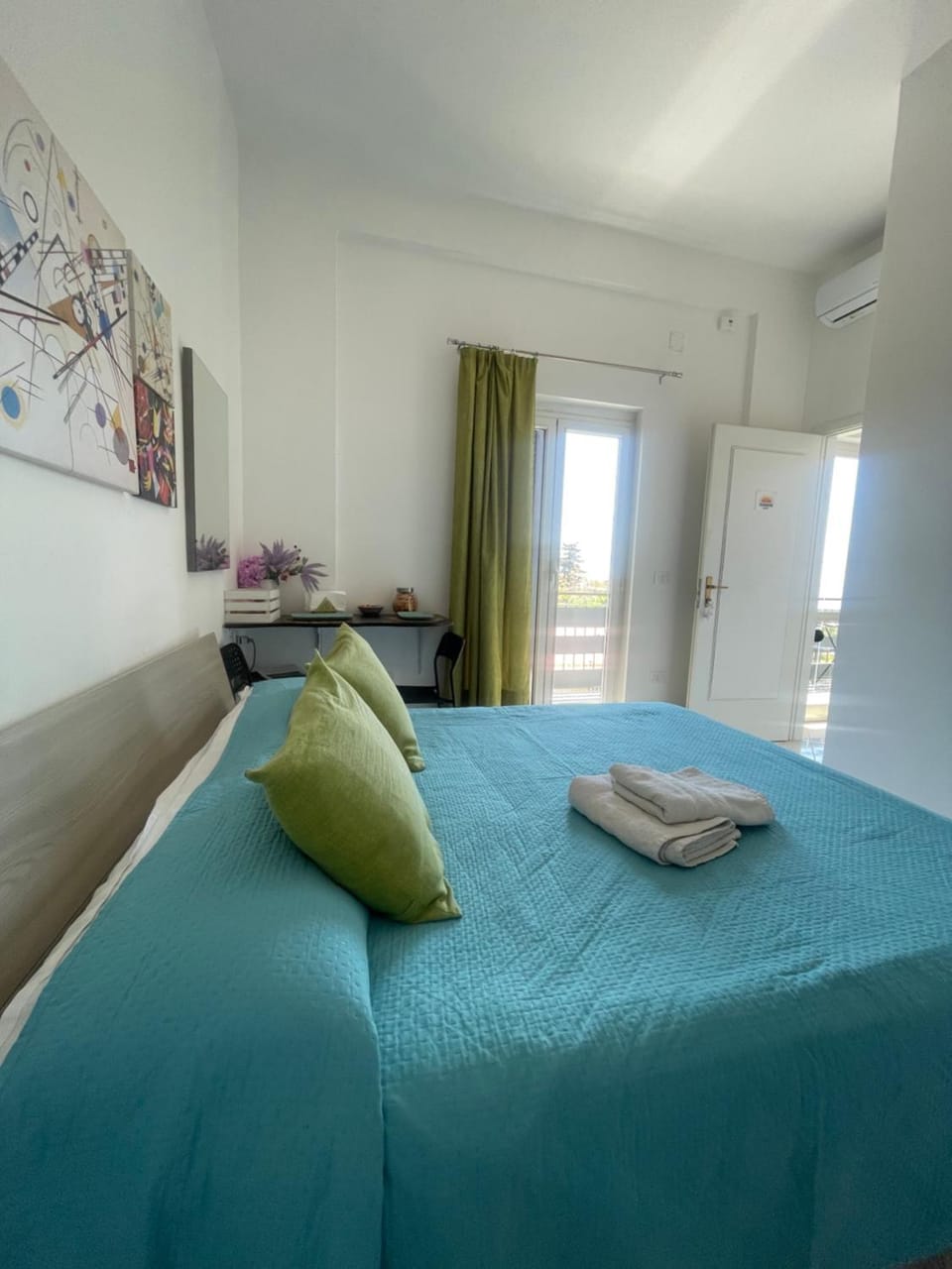 Bed, Photo of the whole room, Bedroom, towels, air conditioner