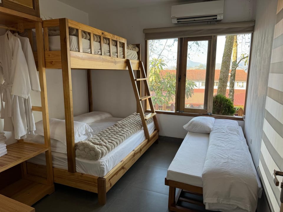 Photo of the whole room, Bedroom, bunk bed, towels, air conditioner