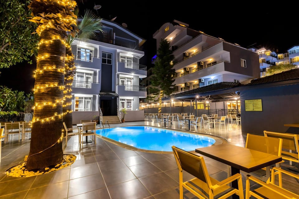 Property building, Night, Pool view, Swimming pool, sunbed