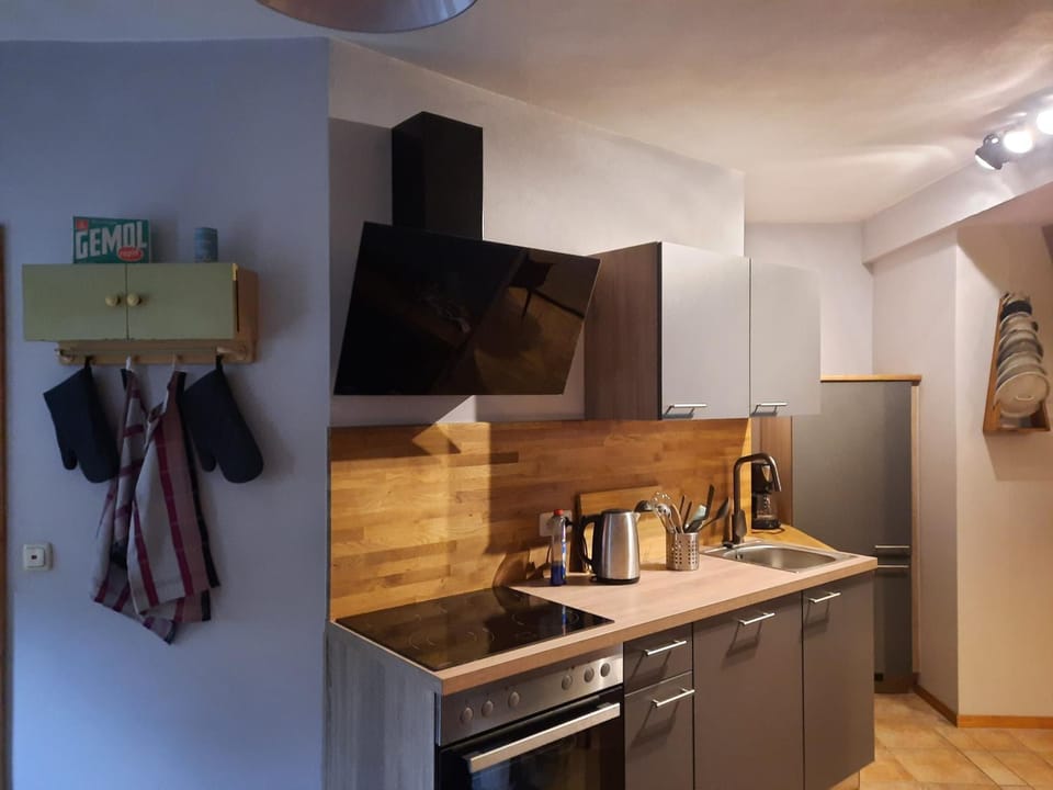 Kitchen or kitchenette, stove