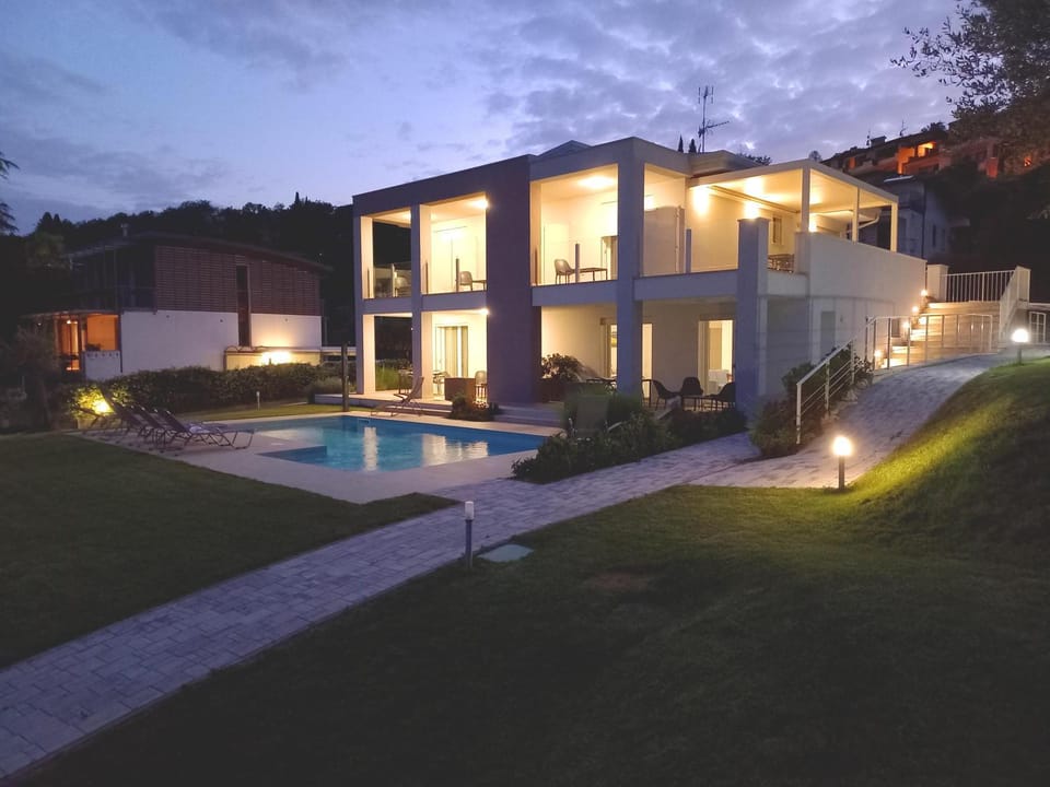 Property building, Patio, Night, Garden, Garden view, Pool view, Swimming pool