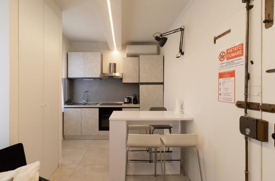 Facade/entrance, Kitchen or kitchenette, Dining area, oven, stove, wardrobe