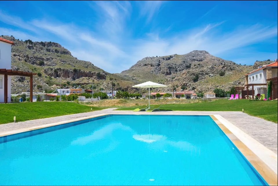 Property building, Day, Natural landscape, Mountain view, Pool view, Swimming pool, sunbed