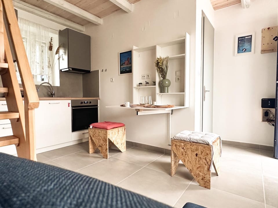 Surf-themed stone house at Kalliopi House in Decentralized Administration of Macedonia and Thrace