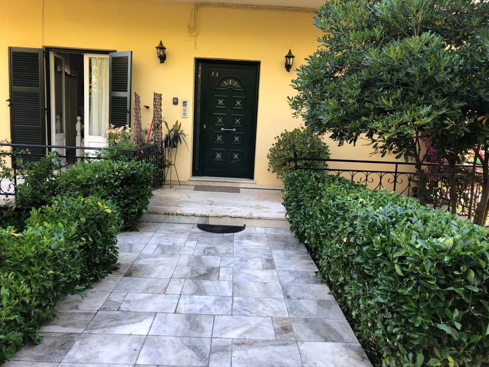 Property building, Facade/entrance, Day, Garden