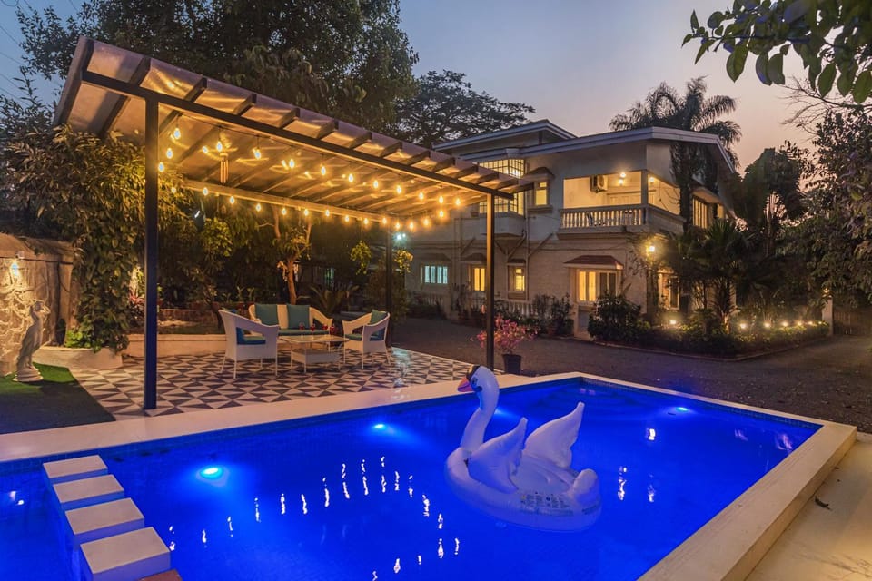Property building, Patio, Facade/entrance, Night, Garden, Garden view, Pool view, Swimming pool, sunbed