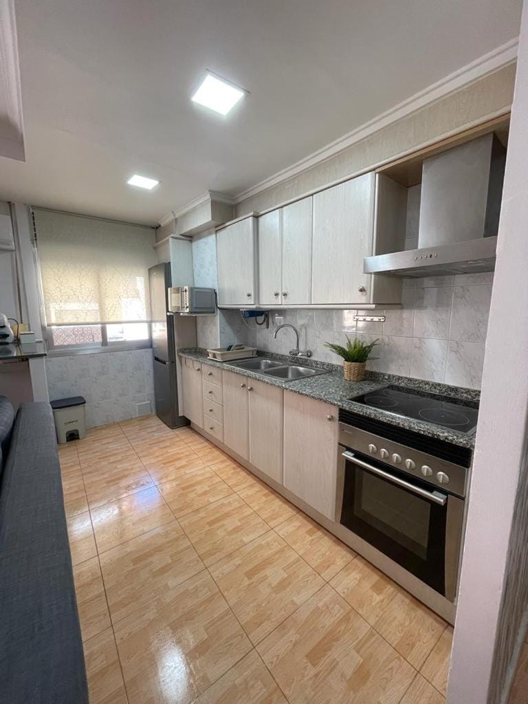 Kitchen or kitchenette, oven, stove
