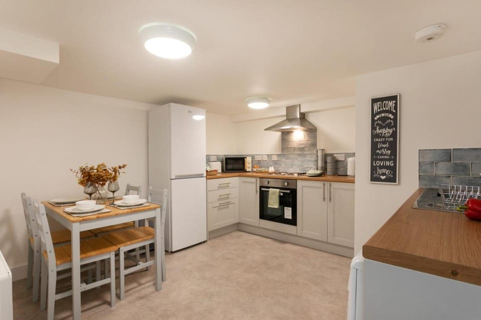 Dining area, minibar, stove, toaster, kitchen