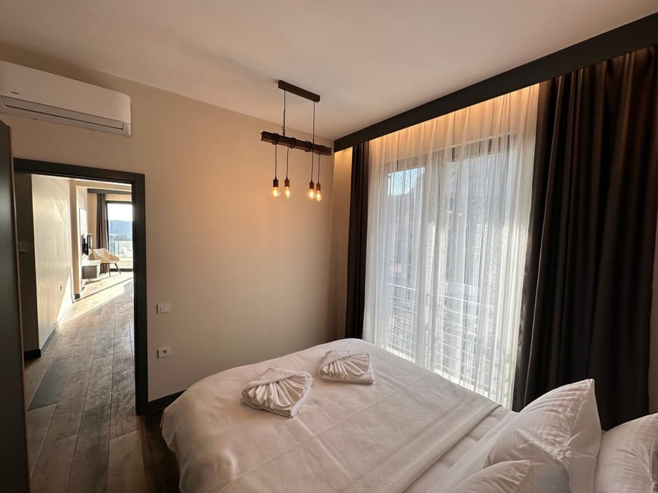 Bed, Photo of the whole room, Bedroom, towels, air conditioner