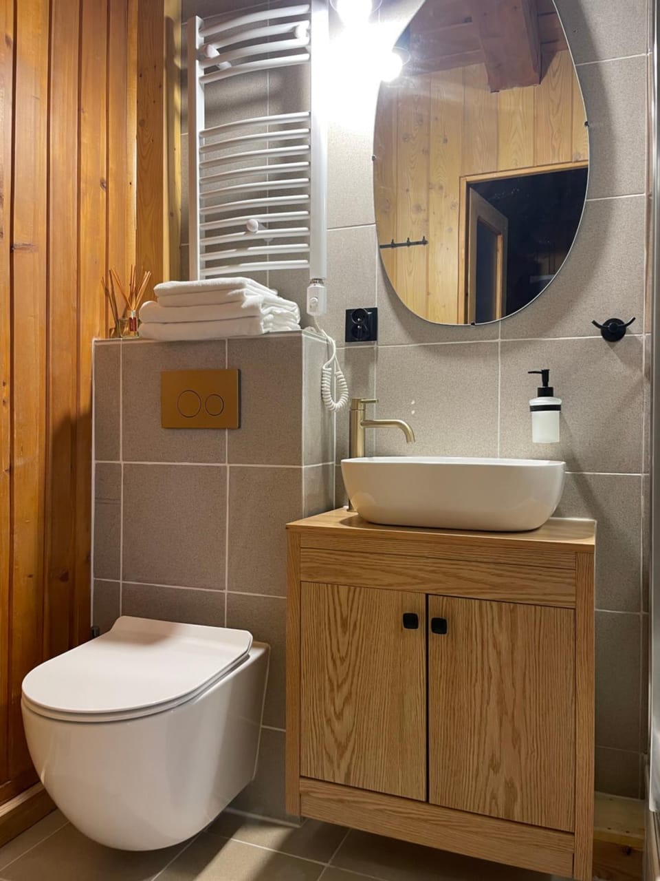 Shower, Toilet, Bathroom, hair dryier, towels