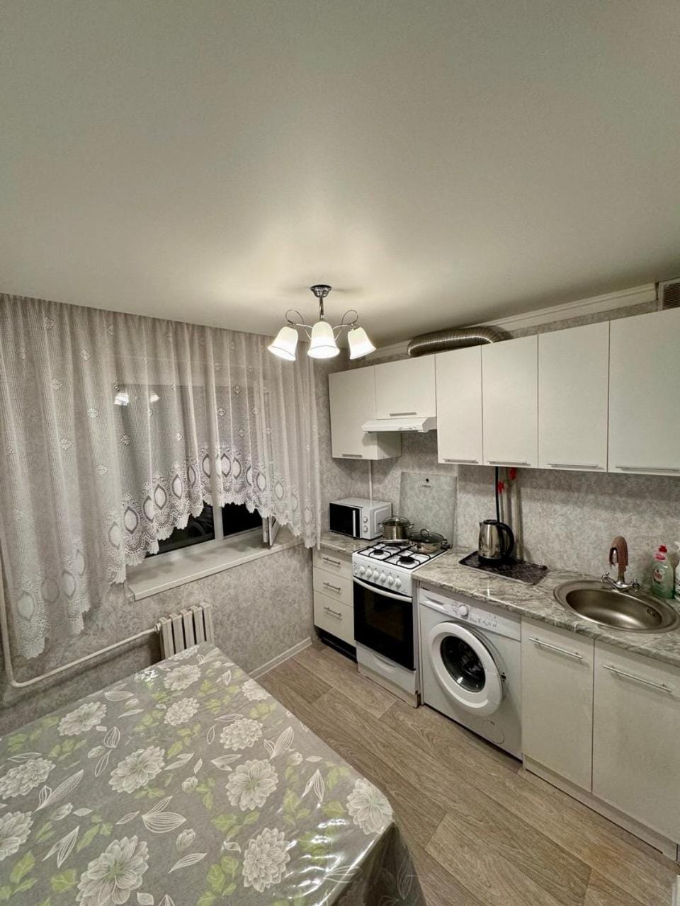 Kitchen or kitchenette, Dining area, oven, stove, washing machine