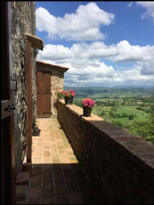Zauber im Turm - in einem der schönsten Dörfer Apartment in Montemerano